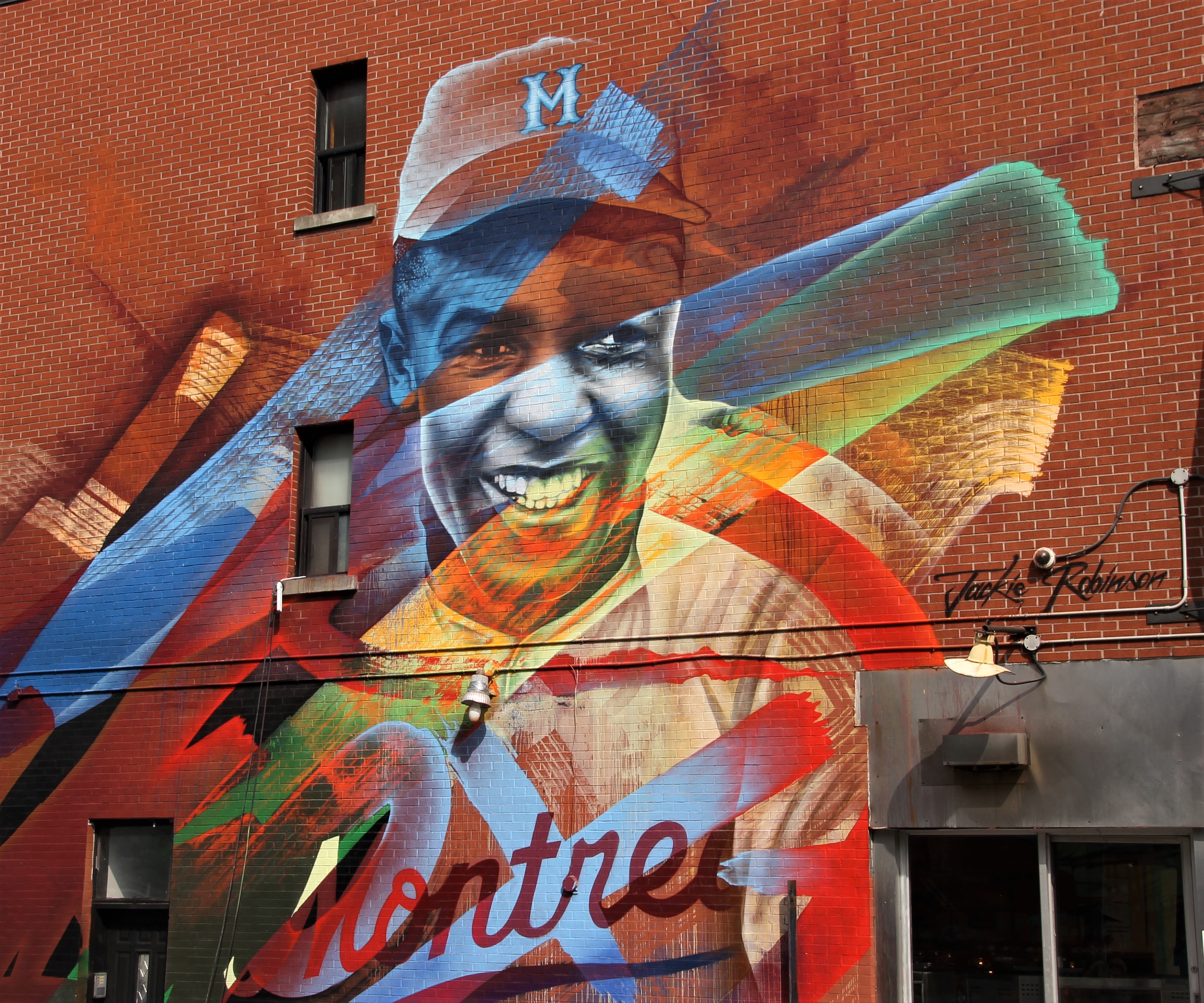 2022/12/montreal-street-art-mural-fest-baseball-player-artist-fluke-roarloud-net