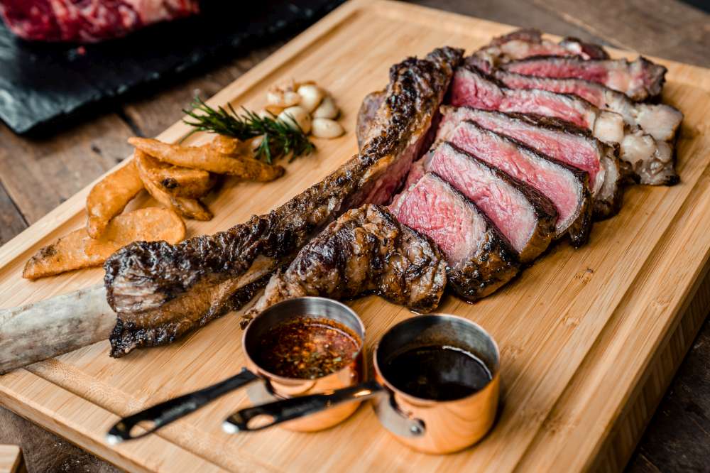 2023/11/sliced-tomahawk-steak-shutterstock-1442985230