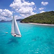 2023/04/sailing-caribbean-turquoisegettyimages-468110918