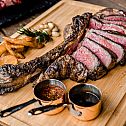 2023/11/sliced-tomahawk-steak-shutterstock-1442985230