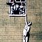 2024/11/355px-banksy-ps